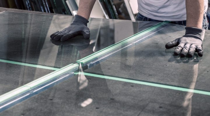 glazier breaking glass on a professional table glazier breaking glass on a professional table